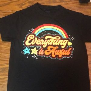 A Spencer’s (S) graphic t-shirt with “everything is awful” printed on the front.